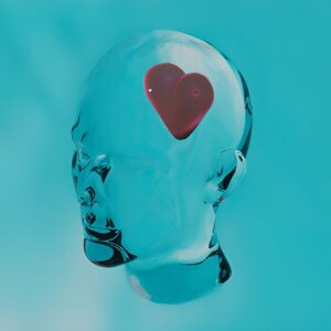 Zeigt Kopf mit Herz darin, symbolisiert die mentale Arbeit durch mentales Training.